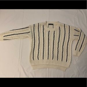 Atmosphere Cream and Black Sweater